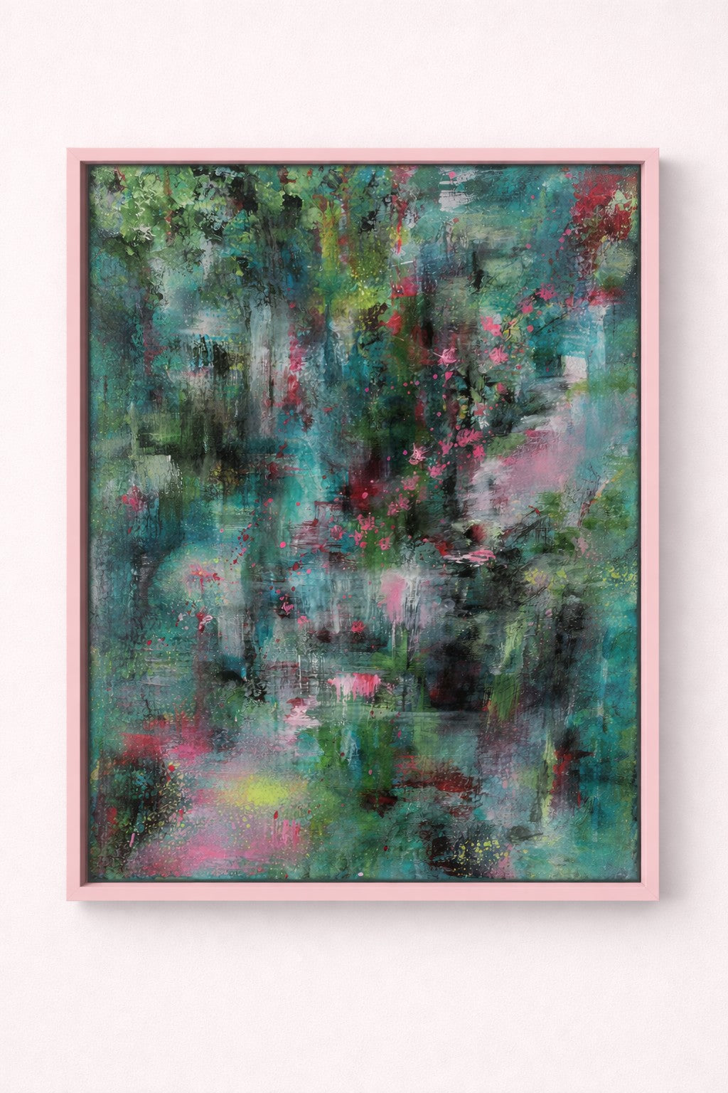 Abstract painting with vibrant colors in a pink frame on a white background