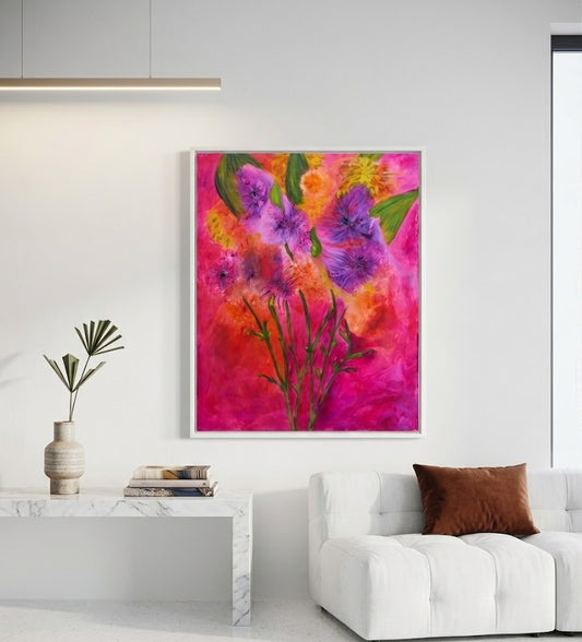 Pink floral abstract painting on the wall, white sofa, and marble coffee table.